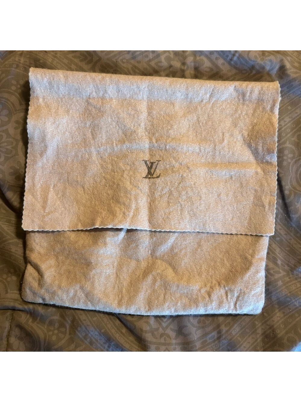 Lv dust bag fold over